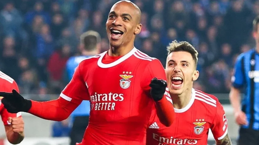 Joao Mario celebrates his goal for Benfica .