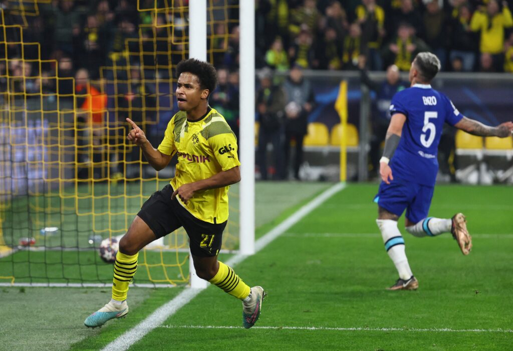 Karim Adeyemi celebrating his Champions League goal against Chelsea.
