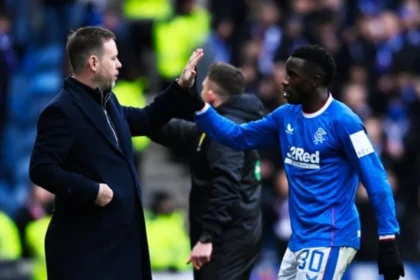 Micheal Beale and Fashion sakala high-fiving