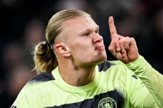 Erling Haaland celebrates his 48th goal of the season at Allianz Arena in Munich- (Picture via Bleacher Football)