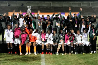 Green Buffaloes Women's FC celebrating their 2022 COSAFA Women's club Champions League victory.