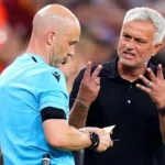 Jose Mourinho confronting English referee Anthony Taylor during the Europa League final at the Puskas Arena in Budapest.