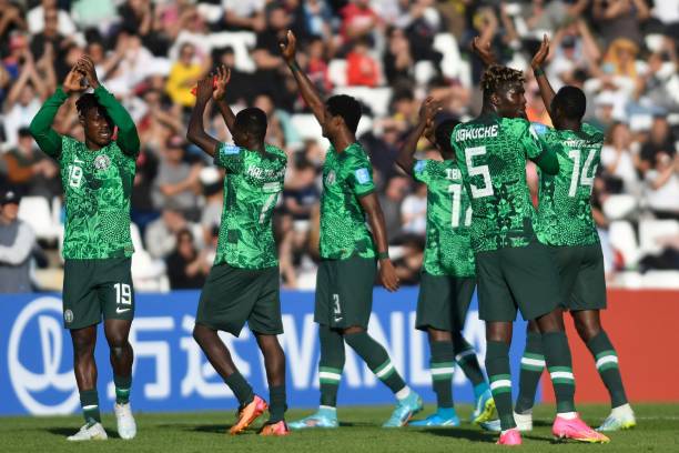 Nigerian players celebrate after the end of the Argentina 2023 U-20 World Cup Group D football match between Nigeria and Dominican Republic at the Malvinas Argentinas stadium in Mendoza, Argentina, on May 21, 2023. (Photo by Andres Larrovere / AFP) (Photo by ANDRES LARROVERE/AFP via Getty Images)