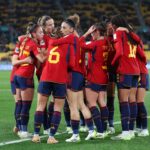 Spain players celebrate the team's first goal scored an own goal by Valeria Del Campo of Costa Rica (not pictured) (Photo by Catherine Ivill/Getty Images)