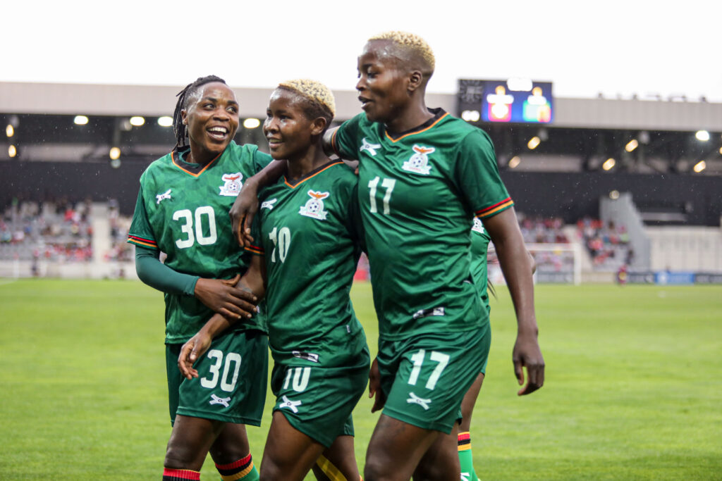 From left to right, Xiomara Mapepa, Grace Chanda and Rachael Kundananji celebrating. (Picture via FAZ media)