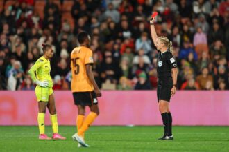 Catherine Musonda shown a red card by referee Tess Olofsson. (Photo by Hagen Hopkins - FIFA/FIFA via Getty Images)