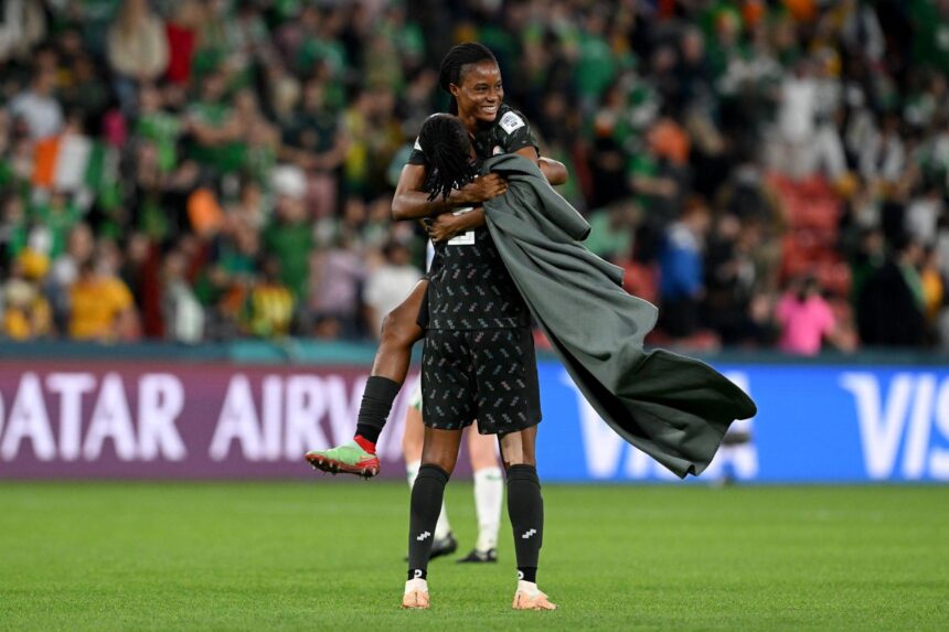 Nigeria players celebrate after the team advanced to the knockouts during the FIFA Women's World Cup Australia & New Zealand 2023 Group B match between Ireland and Nigeria at Brisbane Stadium on July 31, 2023 in Brisbane, Australia. (Photo by Bradley Kanaris/Getty Images)