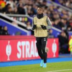 Patson Daka warms up from the bench during the UEFA Conference League Quarter Final Leg One match between Leicester City and PSV Eindhoven at Leicester City Stadium on April 7, 2022 in Leicester, United Kingdom. (Photo by Plumb Images/Leicester City FC via Getty Images)