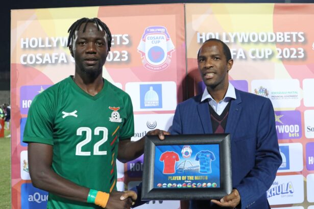 Moyela Lilamba being handed the Player of the match award. (Picture via Cosafa media)