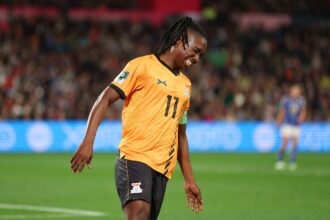 Barbra Banda reacts during the FIFA Women's World Cup Australia & New Zealand 2023 Group C match between Zambia and Japan at Waikato Stadium on July 22, 2023 in Hamilton, New Zealand. (Photo by Catherine Ivill/Getty Images)