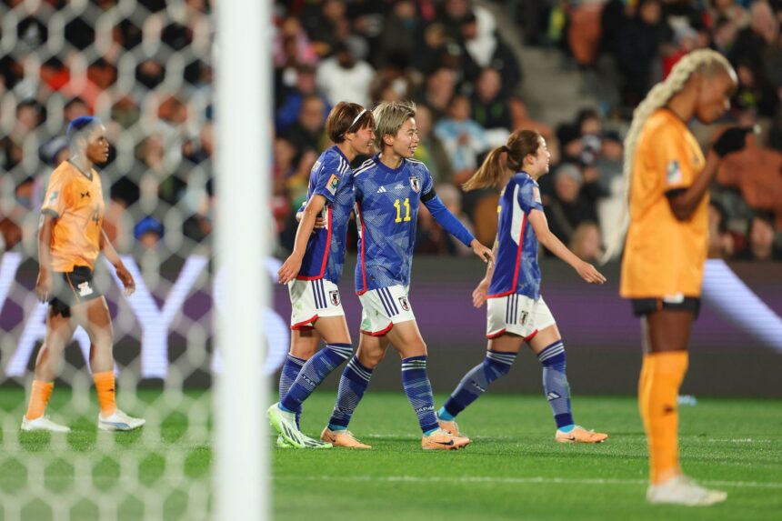 Hinata Miyazawa (2nd L) of Japan celebrates with teammate Mina Tanaka (3rd R) after scoring her team's third goal during the FIFA Women's World Cup Australia & New Zealand 2023 Group C match between Zambia and Japan at Waikato Stadium on July 22, 2023 in Hamilton, New Zealand. (Photo by Catherine Ivill/Getty Images)