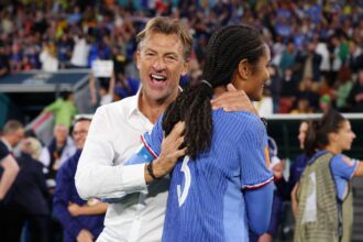 Wendie Renard is congratulated by head coach Herve Renard after the team's 2-1 victory in the FIFA Women's World Cup Australia & New Zealand 2023 Group F match between France and Brazil at Brisbane Stadium on July 29, 2023 in Brisbane, Australia. (Photo by Elsa - FIFA/FIFA via Getty Images)