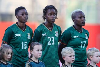From left to right, Agness Musesa, Ochumba Lubanji and Racheal Kundananji look on prior to the Women's international friendly between Germany and Zambia at Sportpark Ronhof Thomas Sommer on July 7, 2023 in Fuerth, Germany. (Photo by Roland Krivec/DeFodi Images via Getty Images)