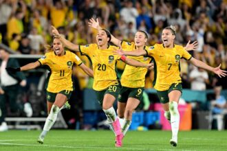 Mary Fowler, Sam Kerr, Caitlin Foord and Steph Catley of Australia celebrate the team’s victory through the penalty shoot out following the FIFA Women's World Cup Australia & New Zealand 2023 Quarter Final match between Australia and France at Brisbane Stadium on August 12, 2023 in Brisbane, Australia. (Photo by Bradley Kanaris/Getty Images)