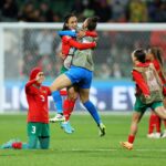 Morocco players celebrate advancing to the knock out stage after the 1-0 victory in the FIFA Women's World Cup Australia & New Zealand 2023 Group H match between Morocco and Colombia at Perth Rectangular Stadium on August 03, 2023 in Perth, Australia. (Photo by Paul Kane/Getty Images)