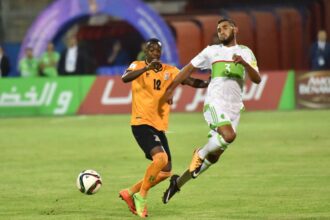 Justin Shonga in action during the 2018 FIFA World Cup qualify match against Algeria. (Photo via AFP)
