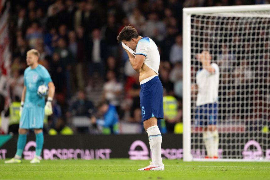 Harry Maguire reacts during the 150th Anniversary Heritage Match between Scotland and England at Hampden Park. (Photo by Michael Regan - The FA/The FA via Getty Images)