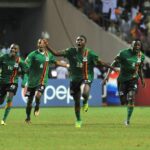 Chipolopolo Boys celebrate victory against Ivory Coast at the stade de l'amitie in Libreville on February 12, 2012, during their Africa Cup of Nations. (Photo by ISSOUF SANOGO/AFP via Getty Images)