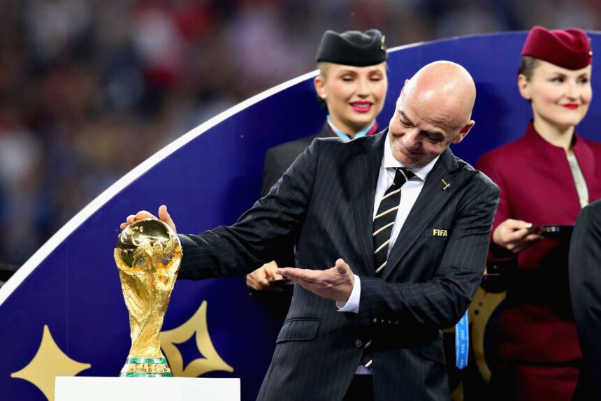 FIFA President Gianni Infantino with the World Cup trophy after the 2018 FIFA World Cup Russia Final between France and Croatia at Luzhniki Stadium on July 15, 2018 in Moscow, Russia. (Photo by Chris Brunskill/Fantasista/Getty Images)