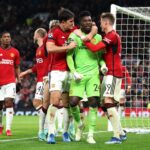 Andre Onana and Harry celebrate after saving a penalty from Jordan Larsson of FC Copenhagen (not pictured) during the UEFA Champions League match between Manchester United and F.C. Copenhagen at Old Trafford. (Photo by Catherine Ivill/Getty Images)