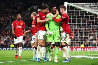 Andre Onana and Harry celebrate after saving a penalty from Jordan Larsson of FC Copenhagen (not pictured) during the UEFA Champions League match between Manchester United and F.C. Copenhagen at Old Trafford. (Photo by Catherine Ivill/Getty Images)