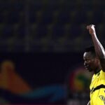 Simon Msuva celebrates scoring his team's first goal during the 2019 Africa Cup of Nations football match between Kenya and Tanzania at the Stadium in Cairo on June 27, 2019. (Photo by JAVIER SORIANO / AFP via GettyImages)