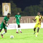 Zephaniah Phiri in posssesion of the ball against Uganda at the Mohammed Bin Zayed Stadium in Abu Dhabi. (Photo via Uganda Cranes)