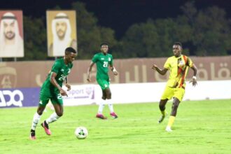 Zephaniah Phiri in posssesion of the ball against Uganda at the Mohammed Bin Zayed Stadium in Abu Dhabi. (Photo via Uganda Cranes)