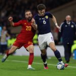 Dani Carvajal of Spain vies with Kieran Tierney of Scotland during the UEFA EURO 2024 qualifying round group A match between Scotland and Spain at Hampden Park on March 28, 2023 in Glasgow, Scotland. (Photo by Ian MacNicol/Getty Images)