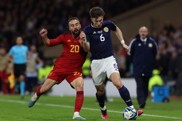 Dani Carvajal of Spain vies with Kieran Tierney of Scotland during the UEFA EURO 2024 qualifying round group A match between Scotland and Spain at Hampden Park on March 28, 2023 in Glasgow, Scotland. (Photo by Ian MacNicol/Getty Images)