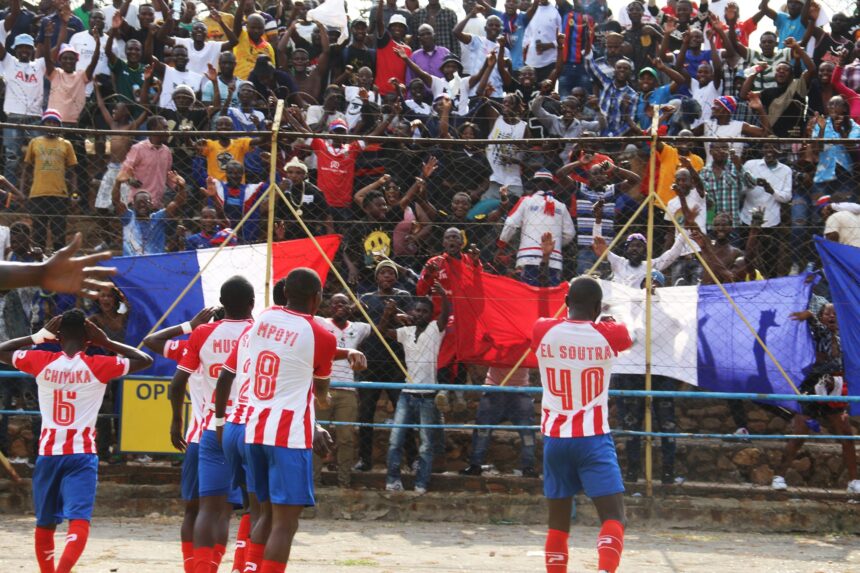 Konkola Blades players and fans celebrate their goal during a Super League match in Chililabombwe. (Photo Konkola Blades media)