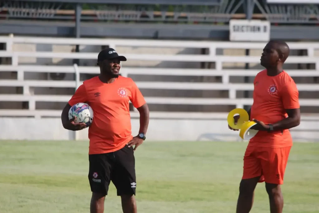 Ian Bakala and his assistant during a training session at the Woodland Staduim in Lusaka. (Photo via Nkana Football Club media)
