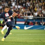 Kylian Mbappe kicks to miss to score on a penalty kick during the French L1 football match between Paris-Saint Germain (PSG) and Montpellier Herault SC at The Parc des Princes Stadium in Paris on August 13, 2022. (Photo by STEPHANE DE SAKUTIN / AFP) (Photo by STEPHANE DE SAKUTIN/AFP via Getty Images)