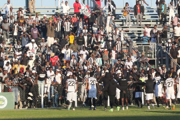 Highlanders players celebrating with fans during a league match. (Photo/courtesy)
