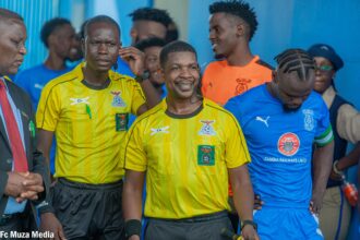Second assistant referee Israel Chikumbi (C) before the match between Kabwe Warriors and FC Muza at the Godfrey Ucar Chitalu stadium in Kabwe. (Photo via FC MUZA media)
