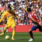Ferran Torres (L) scores his team's first goal during the Spanish league football match between FC Barcelona and Club Atletico de Madrid at the Camp Nou stadium in Barcelona on April 23, 2023. (Photo by Josep LAGO / AFP) (Photo by JOSEP LAGO/AFP via Getty Images)