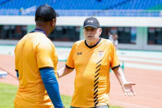Chipolopolo head coach Avram Grant talking to his assistant Moses Sichone during a training session at the Heroes National Stadium in Lusaka. (Photo via FAZ media)