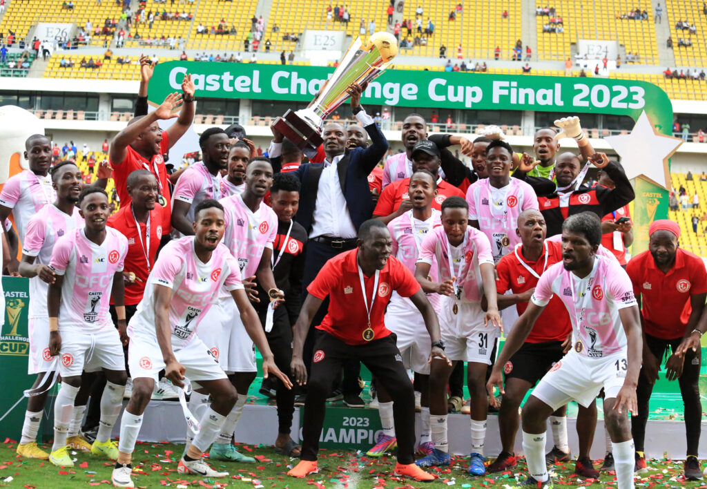 Kallisto Pasuwa celebrating with his players after winning the 2023 Airtel Top 8 Cup. (Photo via FB/FCB Nyasa Big Bullets)