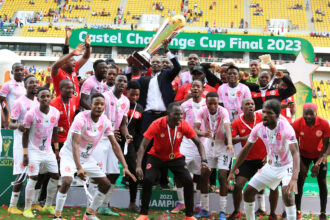 Kallisto Pasuwa celebrating with his players after winning the 2023 Airtel Top 8 Cup. (Photo via FB/FCB Nyasa Big Bullets)