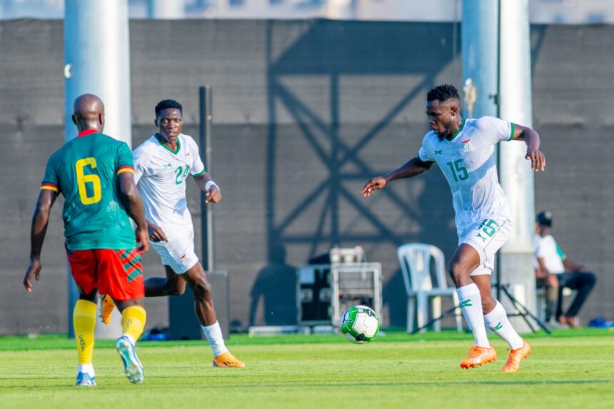 Golden Mafwenta looks on as Kelvin Kampumbu takes posession of the ball during a friendly match against Cameroon in a pre-Afcon friendly game on January 9, 2024 in Saudi Arabia. (Photo via FAZ media)