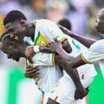 Lamine Camara (C) celebrates with teammates after scoring his team's third goal during the Africa Cup of Nations (CAN) 2024 group C football match between Senegal and Gambia at Stade Charles Konan Banny in Yamoussoukro on January 15, 2024. (Photo by Issouf SANOGO / AFP) (Photo by ISSOUF SANOGO/AFP via Getty Images)