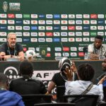 Democratic Republic of Congo's coach Sebastien Desabre (L) and captain Chancel Mbemba speak during a press conference at the Laurent Pokou stadium in San-Pedro on January 16, 2024 on January 16, 2024 on the eve of the Africa Cup of Nations (CAN) 2024 football match between Demorcratic Republic of Congo and Zambia. (Photo by SIA KAMBOU/AFP via Getty Images)