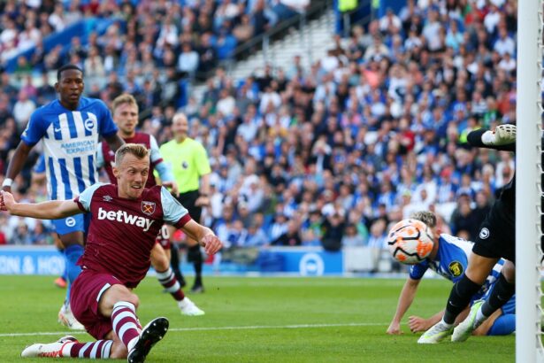 James Ward-Prowse of West Ham United scores the team's first goal during the Premier League match between Brighton & Hove Albion and West Ham United at American Express Community Stadium on August 26, 2023 in Brighton, England. (Photo by Charlie Crowhurst/Getty Images)