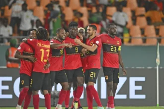 Angolan players celebrating their qualification for the round of 16 after beating Burkina Faso. (Photo via CAFonline)