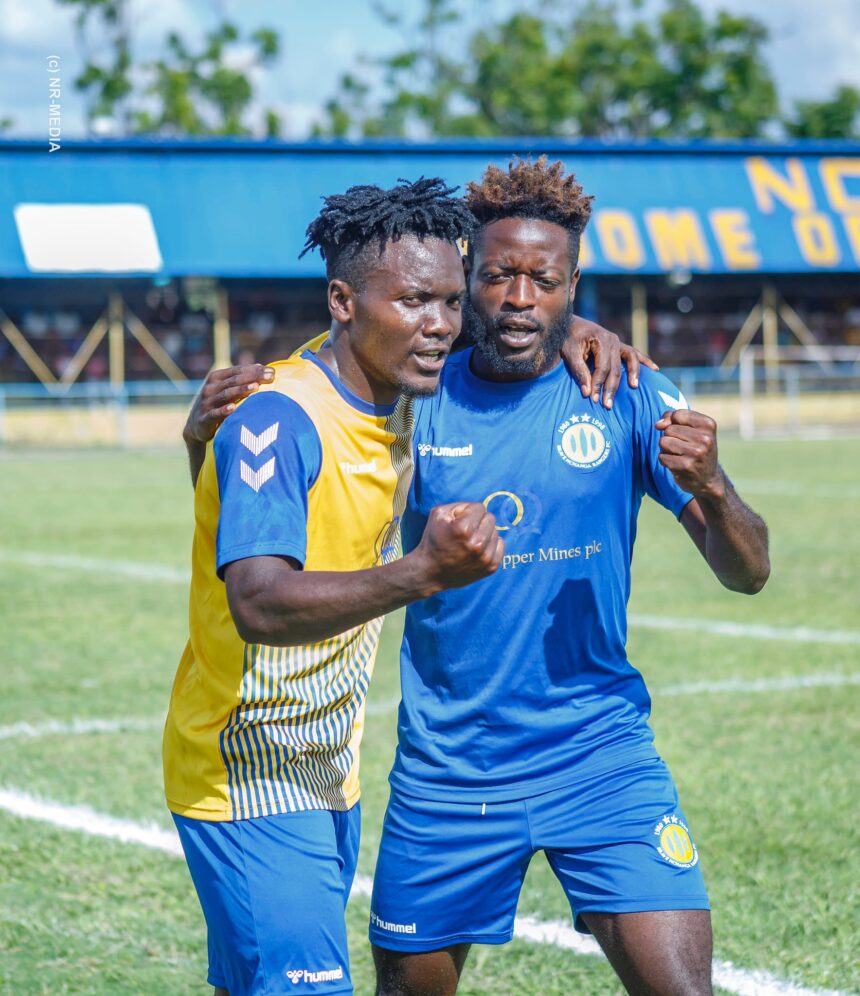 Maxwell Mulutula (L) celebrates with a teammate. (Photo/courtesy)
