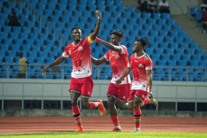 Micheal Olunga celebrates his hat-trick against Zimbabwe with his teammates at the Bingu National Stadium in Lilongwe, Malawi. (Photo via FAM media)