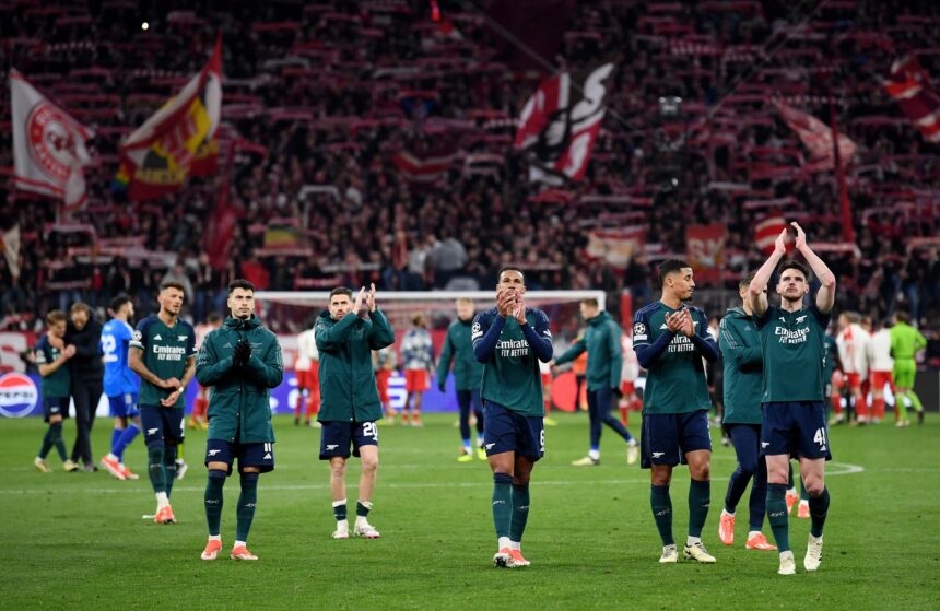 MUNICH, GERMANY - APRIL 17: Players of Arsenal applaud the fans after the team's defeat and elimination from the UEFA Champions League after the UEFA Champions League quarter-final second leg match between FC Bayern München and Arsenal FC at Allianz Arena on April 17, 2024 in Munich, Germany. (Photo by David Price/Arsenal FC via Getty Images)