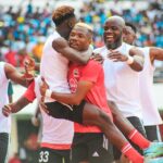 James Chamanga celebrates with teammates after winning the 2024 ABSA Cup final at the National Heroes Stadium in Lusaka. (Photo via Red Arrows FC media)