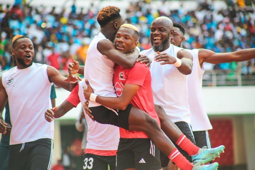 James Chamanga celebrates with teammates after winning the 2024 ABSA Cup final at the National Heroes Stadium in Lusaka. (Photo via Red Arrows FC media)