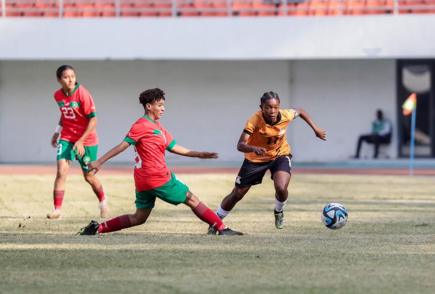 Zambia's Zangose Zulu takes on Moroccan defenders at the National Heroes stadium in Lusaka. (Photo via FAZ media)